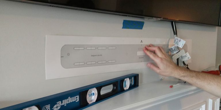 TV and Sonos Playbar Mounted Over Fireplace | Grand Central Wiring